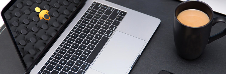 Coffee cup and Laptop